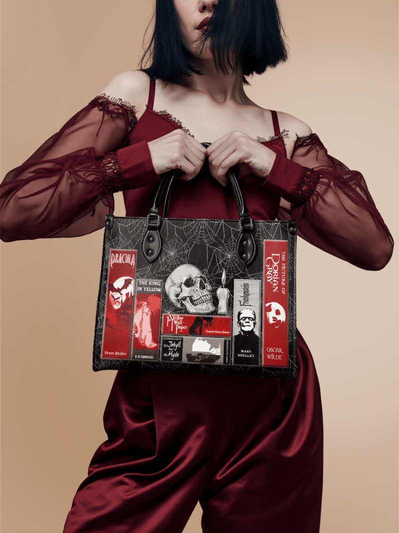 Poe-Web-inuse-1_7cbda049-ce38-459b-be15-3c2e0c4b1cf9.png The Codex of Gothic Tales Black Widow’s Kiss Leather Handbag, Red Interior